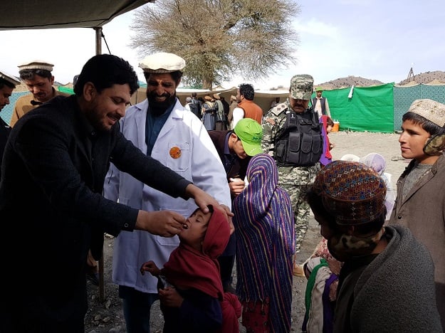 Political Agent administers polio drops. PHOTO: EXPRESS