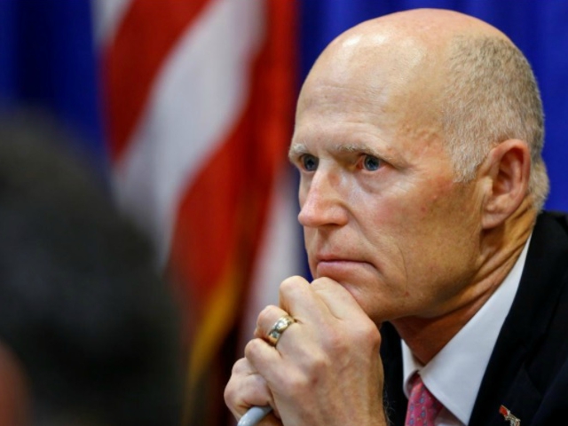 Florida Governor Rick Scott listens during a meeting with law enforcement, mental health, and education officials about how to prevent future tragedies in the wake of last week's mass shooting at Marjory Stoneman Douglas High School, at the Capitol in Tallahassee, Florida, U.S. PHOTO: REUTERS