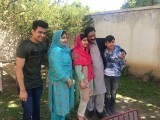 Malala and her family visit thier old house in Swat. PHOTO: EXPRESS