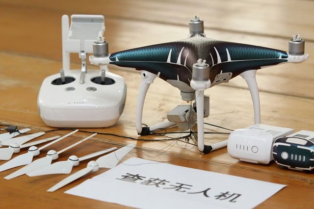 a drone that was confiscated after authorities arrested suspects who used drones to smuggle smartphones from hong kong to shenzhen is pictured in shenzhen guangdong province china march 29 2018 photo reuters