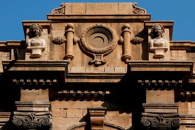 Two female busts are seen on a building, built in the British colonial period, in Karachi, Pakistan, January 31, 2018. PHOTO: Reuters