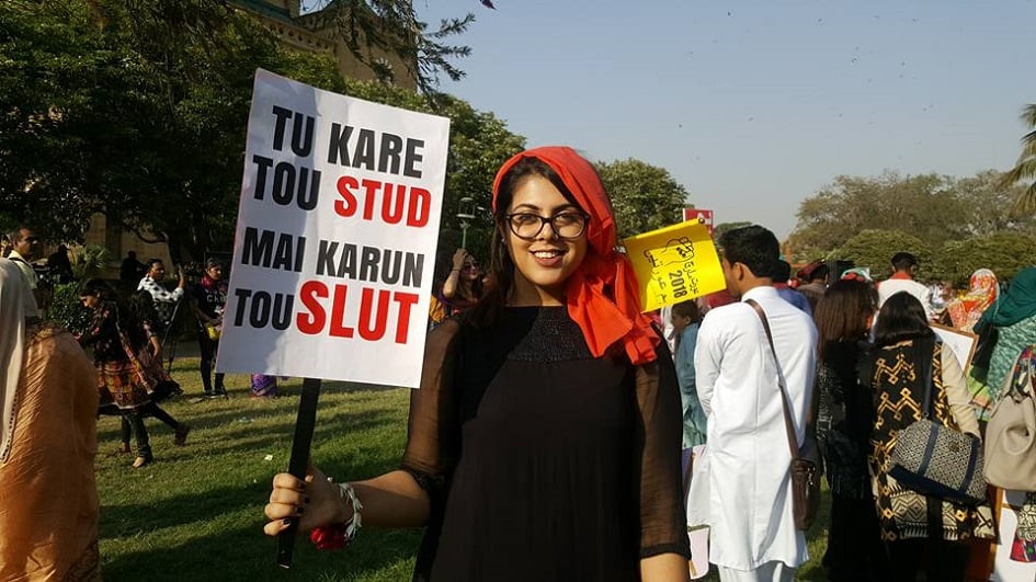 Campaigner holds placard which demands for more equality and less prejudice - Photo Courtesy Hija Kamran