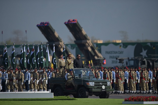 Pakistani tank crews steer their vehicles during the Pakistan Day military parade in Islamabad on March 23, 2018. PHOTO: AFP