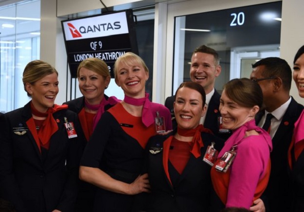 Cabin crew wait to board a Qantas 787 Dreamliner before taking off on its inaugural flight from Perth to London on March 24, 2018. PHOTO: AFP 