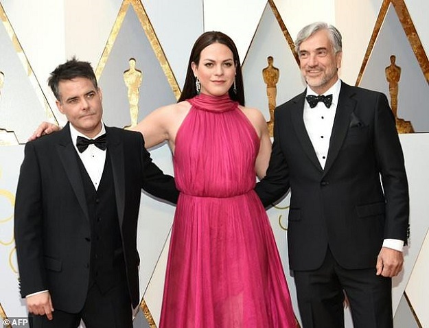 Chilean director Sebastian Lelio (L) and Daniela Vega arrive for the 90th Annual Academy Awards on March 4, 2018. PHOTO: AFP