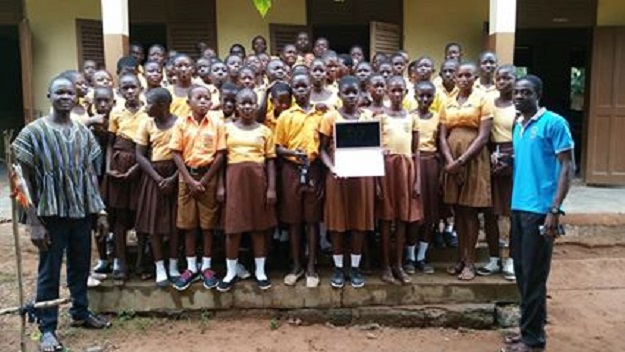 Students with their gift. PHOTO: From Owura Kwadwo Hottish's Facebook page