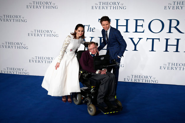 In this file photo taken on December 09, 2014 British actors Felicity Jones (L) and Eddie Redmayne (R) pose with British scientist Stephen Hawking (C) at the UK premiere of the film 'The Theory of Everything' in London. PHOTO: AFP