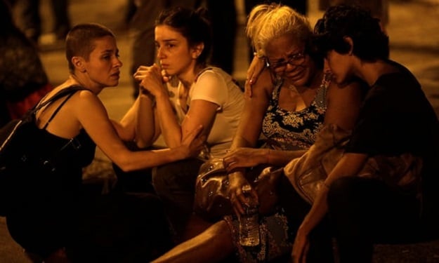 Supporters of Rio city councilor Marielle Franco gather to mourn her death PHOTO:REUTERS