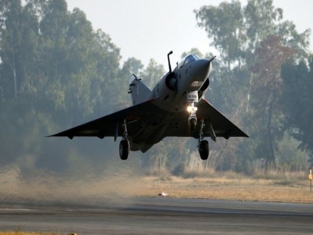 In this picture taken on December 27, 2017, a Mirage aircraft of the Pakistan Air Force (PAF) takes off at the Pakistan Aeronautical Complex after an overhaul at the Mirage Rebuild Factory (MRF) in Kamra, west of the capital Islamabad. PHOTO: AFP