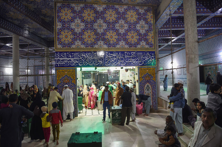 Pakistani devotees gather at the shrine of Sufi Saint Abdullah Shah Ghazi in Karachi. PHOTO: AFP