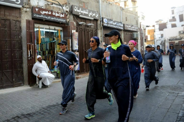 In Saudi Arabia, a sports-friendly version of the abaya gown is becoming the new normal and being seen less as a symbol of cultural rebellion. PHOTO: AFP