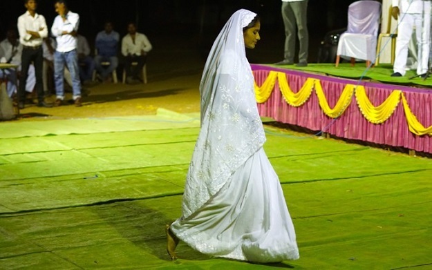 A woman participates in a conversion ceremony in India. PHOTO COURTESY: THE ATLANTIC