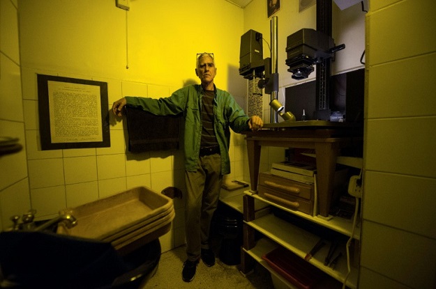Venezuelan darkroom technician Rodrigo Benavides refuses to go digital. PHOTO: AFP