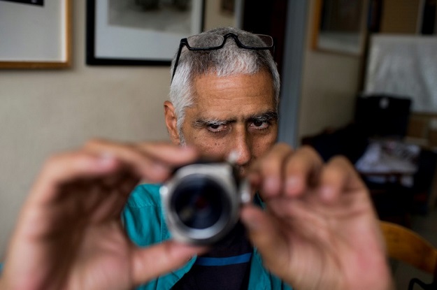 Although working with equipment and techniques that have virtually disappeared, he carries on as if digital photography does not exist. PHOTO: AFP