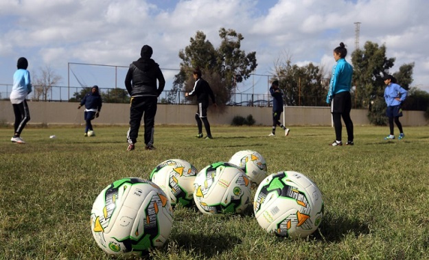 Training young Libyan women to play football to an international standard is a challenge but often the hardest part is convincing their parents to allow them to play at all. PHOTO: AFP