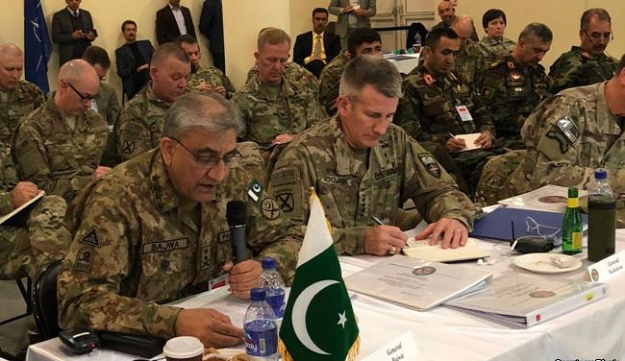 Pakistan army chief General Qamar Javed Bajwa (L) and Commadner of U.S. and Resolute Support military mission General John Nicholson attending the security conference in Kabul, Feb. 13, 2018. PHOTO: ISPR