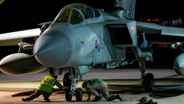 An RAF Tornado taxis into its hangar after landing in Akrotiri after completing its mission. PHOTO COURTESY: CNN