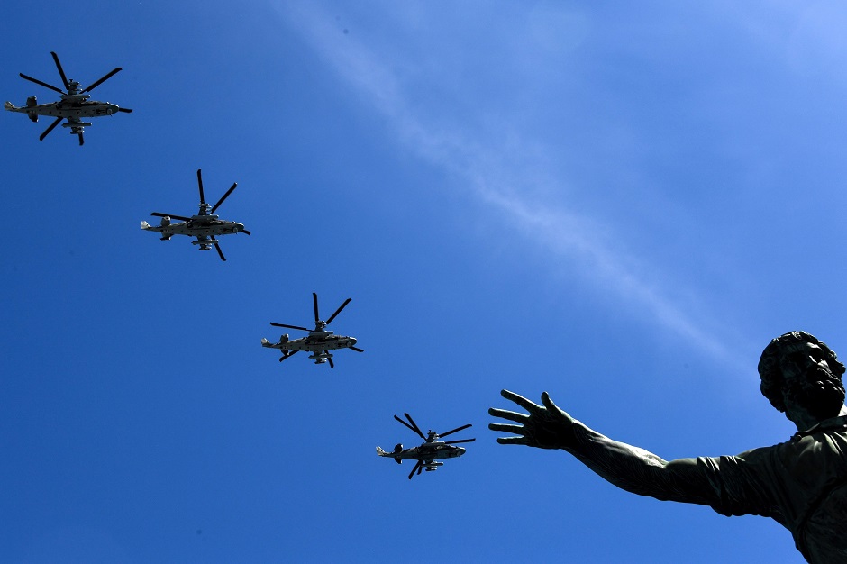 Russian Ka-52 helicopters fly over Red Square during the Victory Day military parade. PHOTO: AFP 