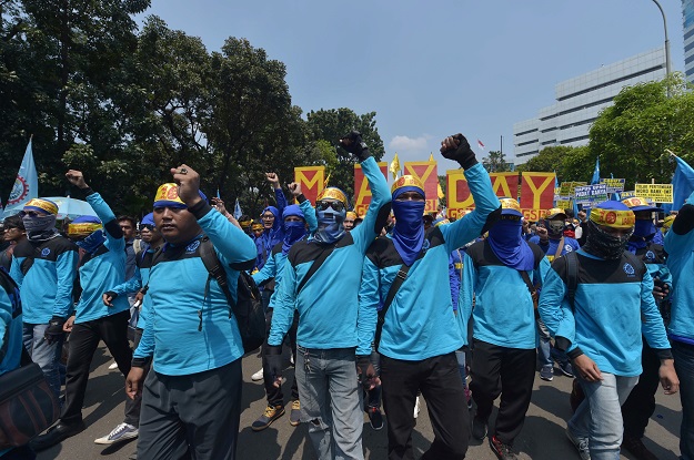 . Indonesian workers take part in a May Day rally in Jakarta. PHOTO: AFP