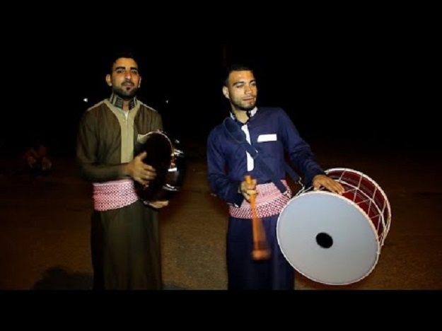 At night young men in Mosul walk the streets beating drums to announce the pre-dawn breakfast during Ramzan. PHOTO: FEDGENO.COM