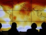 participants-looks-at-a-screen-projecting-a-world-map-with-climate-anomalies-during-the-world-climate-change-conference-2015-cop21-at-le-bourget-3-2-2-2-3-2-2-2-2-2-2-3-2-3-2-2