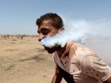 a-picture-and-its-story-tear-gas-canister-puts-gazan-on-life-support