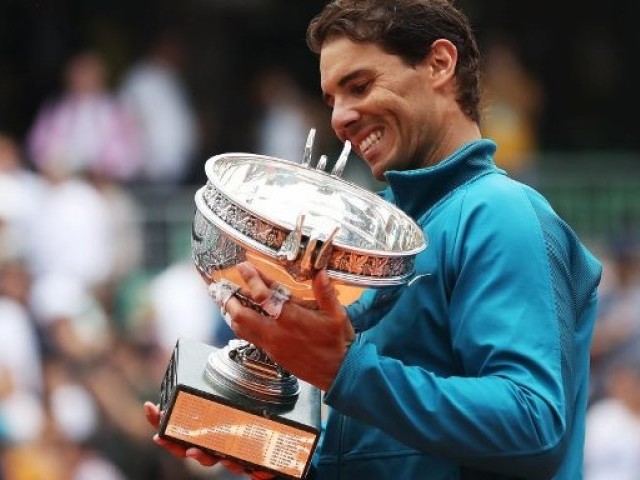 Rafael Nadal brushed aside Dominic Thiem in straight sets to win his 11th title at Roland Garros to further consolidate his claim as the undisputed King of Clay. PHOTO: AFP