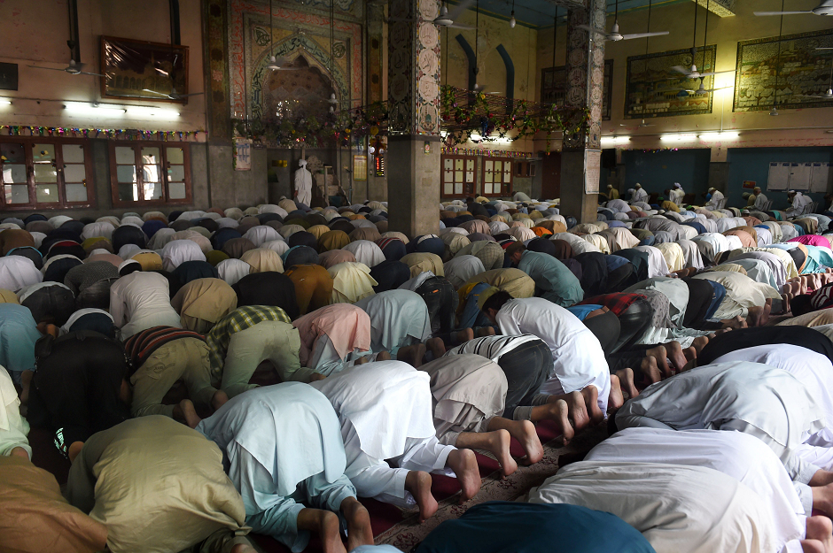 Men offer Friday prayers at a mosque in Lahore.Â PHOTO: AFP/ Arif Al.