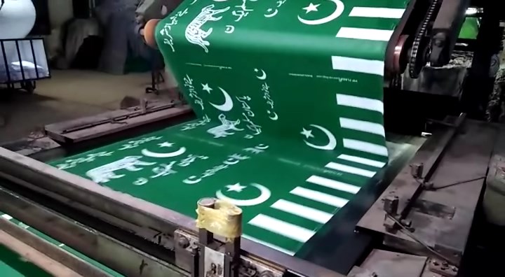 Pakistan Muslim League - Nawaz flags being printed at the factory. PHOTO: EXPRESS