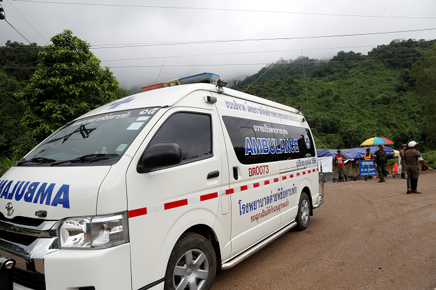 An ambulance is seen near the Tham Luang cave complex, where members of a soccer team trapped are in a flooded cave. PHOTO: REUTERS