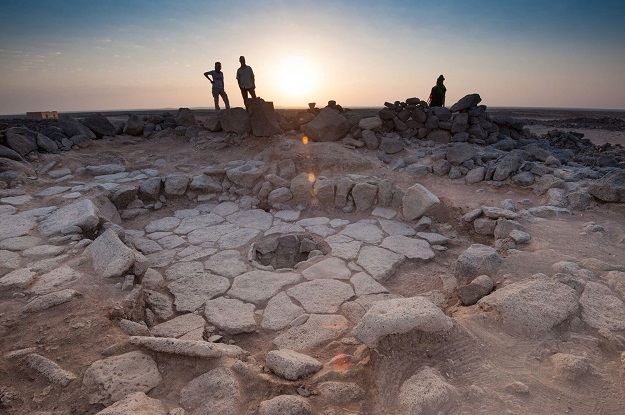 A stone structure at an archeological site containing a fireplace, seen in the middle, where charred remains of 14,500-year-old bread was found in the Black Desert, in northeastern Jordan in this photo provided July 16, 2018. PHOTO: REUTERS