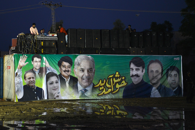A DJ performs during an election campaign rally by Shahbaz Sharif. PHOTO:AFP