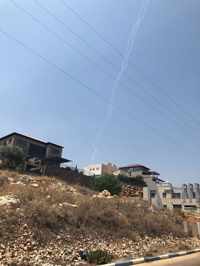 Smoke trails from two Patriot missiles can be seen near the Israeli city of Safed in northern Israel July 24, 2018. REUTERS