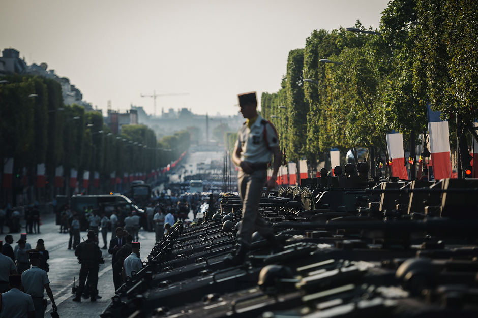 Military regiments take their positions near the Arc de Triomphe. PHOTO: AFP.