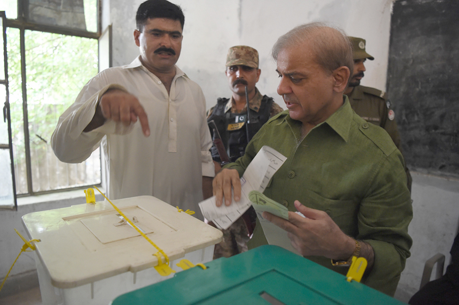 Shahbaz Sharif casts his vote. PHOTO: AFP. 