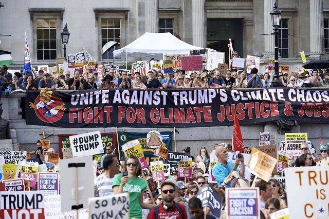 Protesters against the UK visit of US President Donald Trump gather in Trafalgar Square after taking part in a march in London on July 13, 2018. PHOTO: AFP