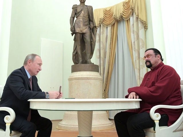 President Vladimir V. Putin of Russia meeting with Steven Seagal at the Kremlin in 2016. Russian officials said Mr. Seagal was named a special representative to promote humanitarian ties between Russia and the United States.PHOTO: THE TELEGRAPH