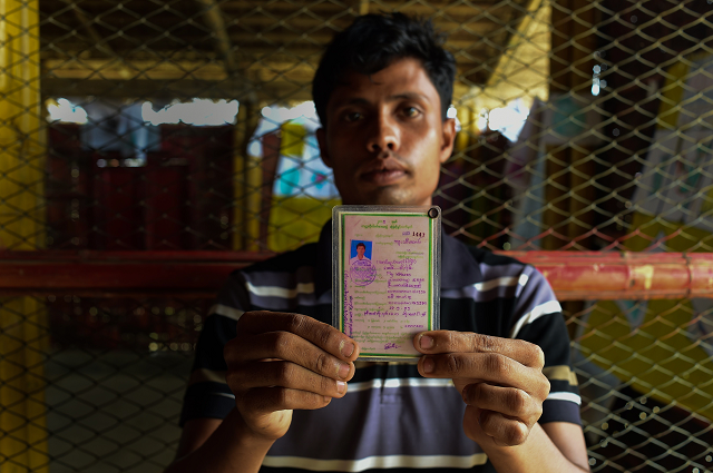 mohammad khares with his school id card in jamtoli refugee camp in ukhia in the bangladesh border area near myanmar photo afp