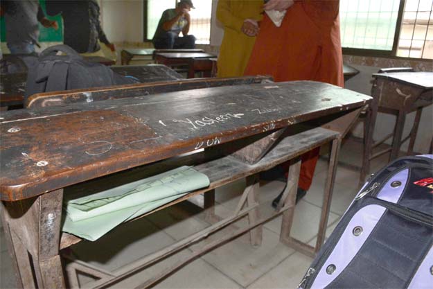 A view of the ballot papers hidden inside the Gizri school. PHOTO: EXPRESS