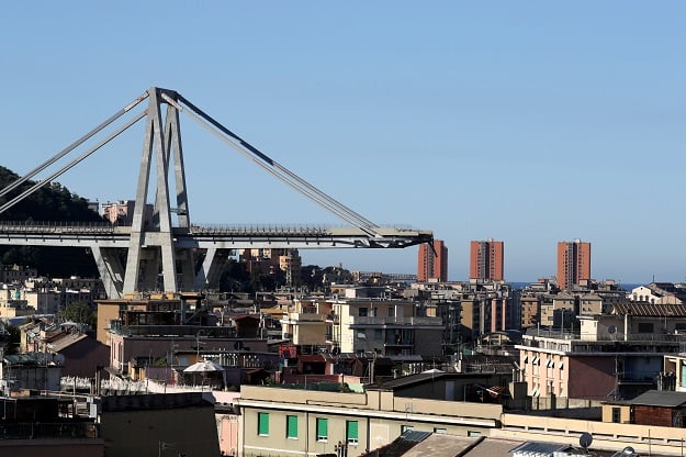 The collapsed Morandi Bridge is seen in the Italian port city of Genoa, Italy. PHOTO: REUTERS