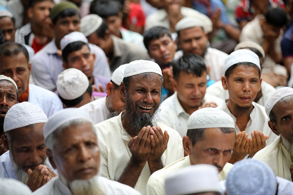  Rohingya refugeees pray as they take part in a protest at the Kutupalong refugee camp. PHOTO: REUTERS