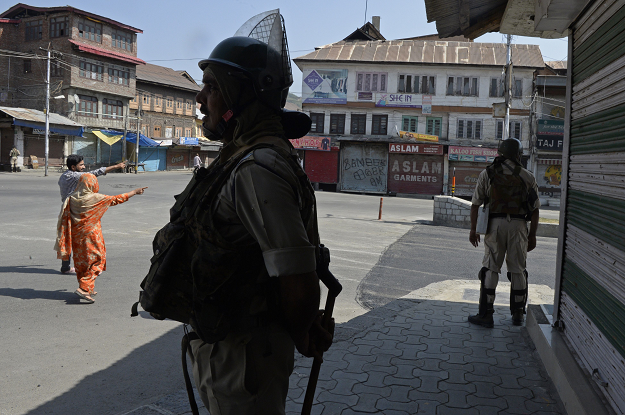 Indian paramilitary troopers stand guard. PHOTO:AFP