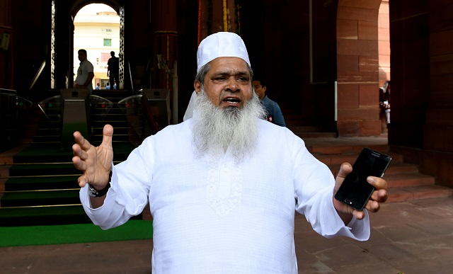 Member of parliament from the Indian state of Assam, Badruddin Ajmal gestures as he arrives at the Indian Parliament in New Delhi on August 1, 2018. PHOTO: AFP