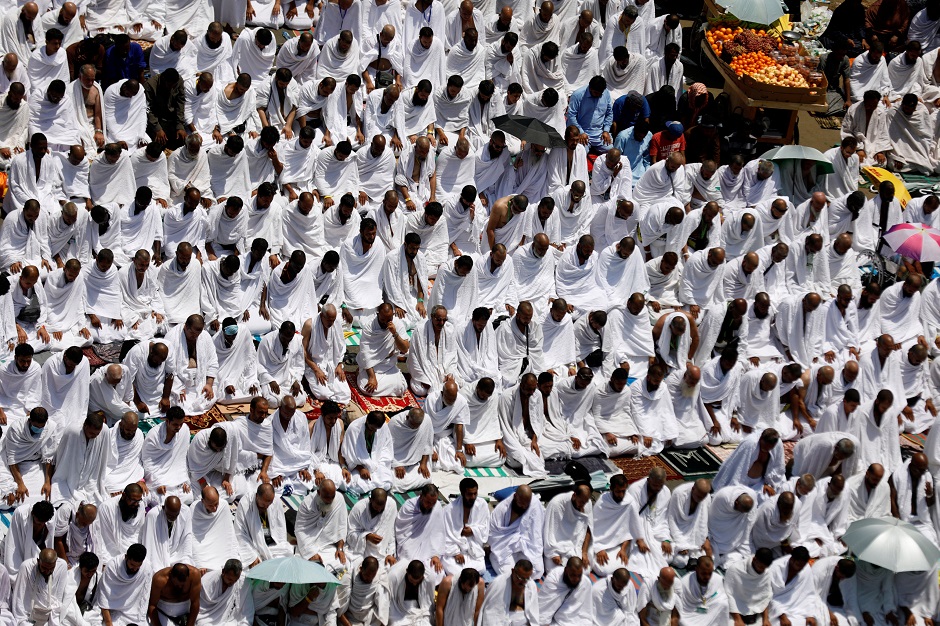 Pilgrims pray outside Namira mosque on the plains of Arafat during Hajj on August 20, 2018. PHOTO:REUTERS