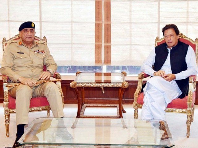 Gen Qamar Javed Bajwa meets Imran Khan at PM secretariat. PHOTO: PID