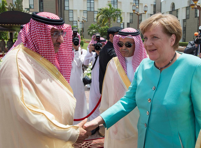 saudi crown prince mohammed bin nayef shakes hands with german chancellor angela merkel during a reception ceremony in jeddah saudi arabia photo reuters