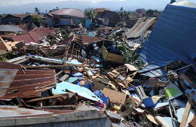 people search through debris in a residential area following an earthquake and tsunami in palu photo reuters