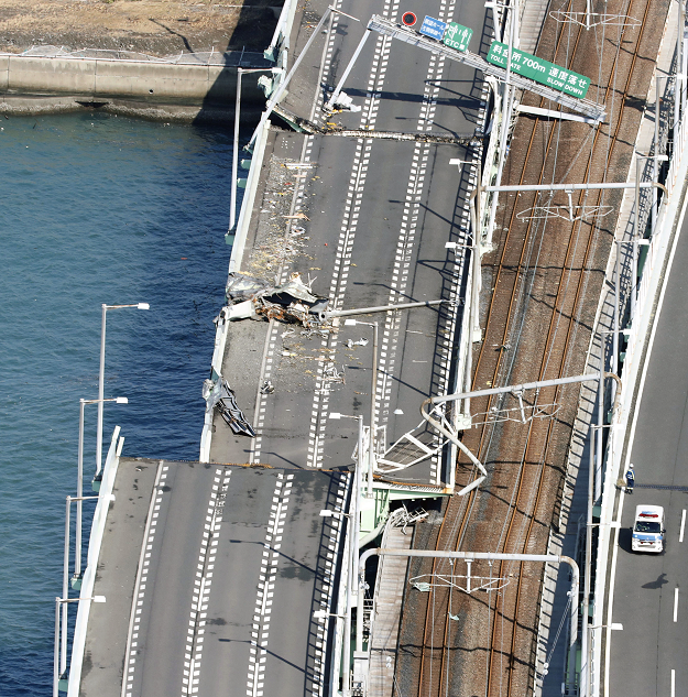 A bridge connecting Kansai airport, damaged by crashing with a 2,591-tonne tanker,. PHOTO:REUTERS