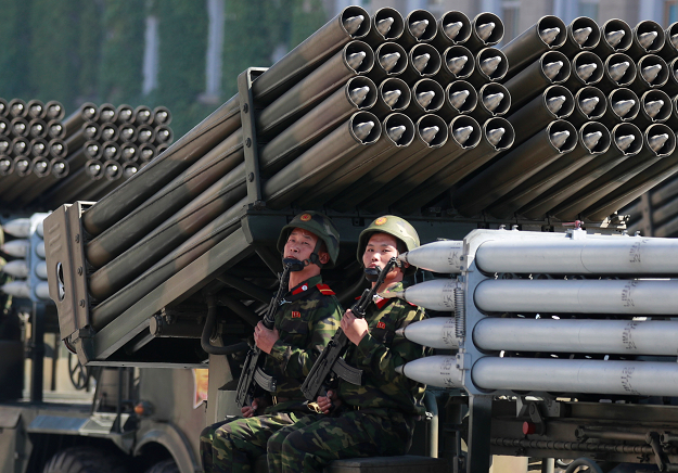  Soldiers ride a multiple rocket launcher during a military parade marking the 70th anniversary of North Korea's foundation. PHOTO:REUTERS