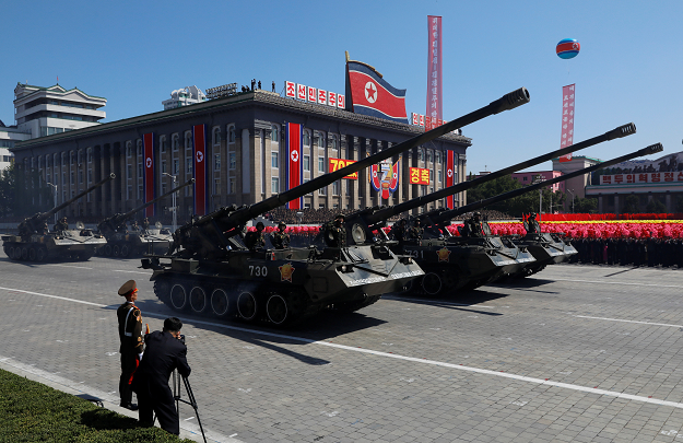 Self propelled artillery roll pass during a military parade marking the 70th anniversary of North Korea's foundation. PHOTO:REUTERS